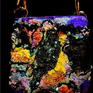 Hand-crafted beaded cross body bag